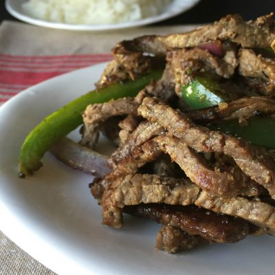 Strip Steak with green peppers and onions